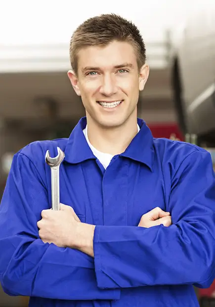 mechanic holding wrench